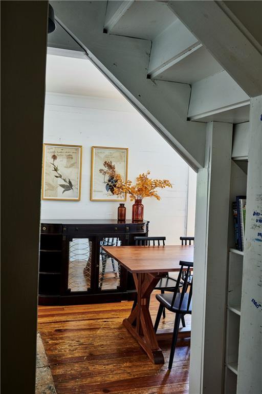 dining room with hardwood / wood-style flooring