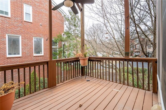 wooden deck with ceiling fan