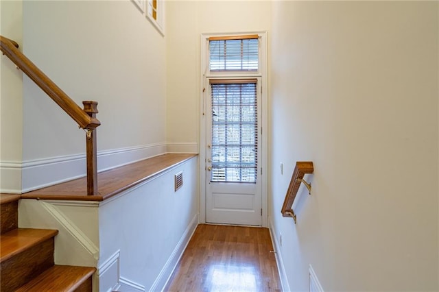 doorway featuring hardwood / wood-style floors