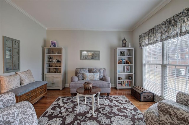 living room featuring crown molding and hardwood / wood-style floors