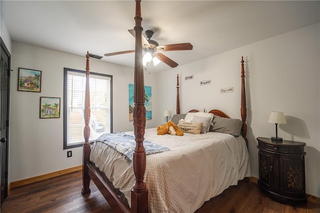 bedroom featuring ceiling fan and dark wood-type flooring