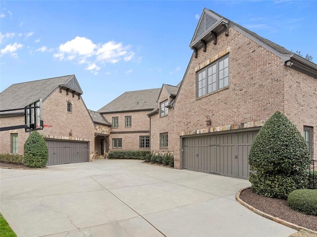 view of side of property with a garage