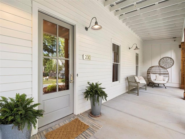 entrance to property with a porch