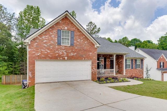 1751 Fire Side Ct, Jefferson, GA 30549 - traditional home featuring brick siding, an attached garage, concrete driveway, and a porch