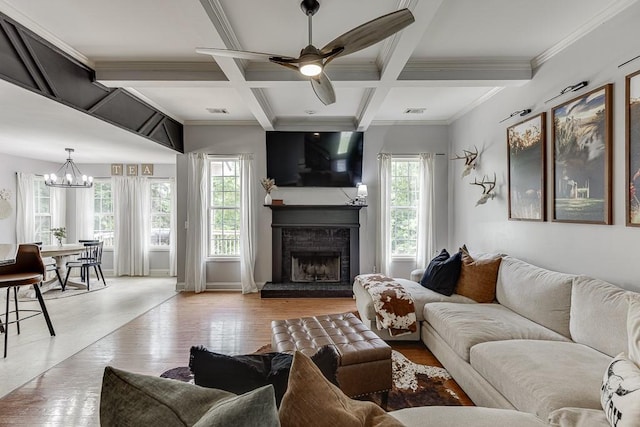 1751 Fire Side Ct, Jefferson, GA 30549 - living room featuring a chandelier, a brick fireplace, wood finished floors, ceiling fan, and beamed ceiling