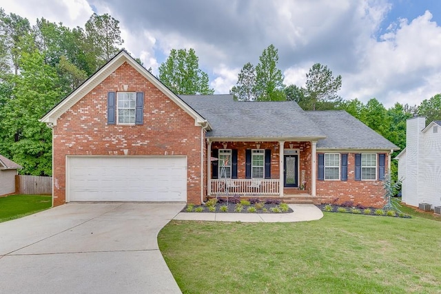 1751 Fire Side Ct, Jefferson, GA 30549 - view of front of home with a porch, brick siding, concrete driveway, and a garage