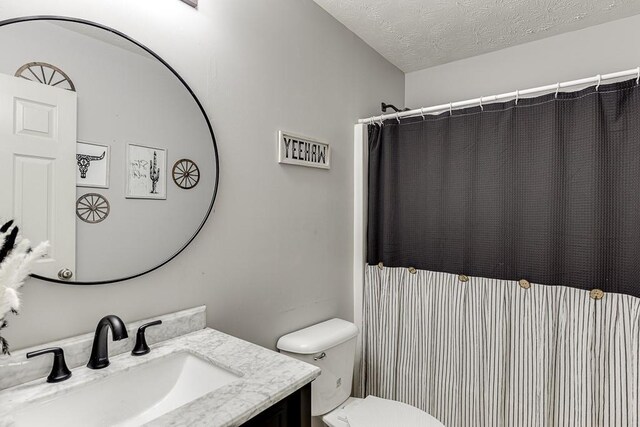 1751 Fire Side Ct, Jefferson, GA 30549 - full bathroom featuring vanity, a textured ceiling, and a shower with shower curtain