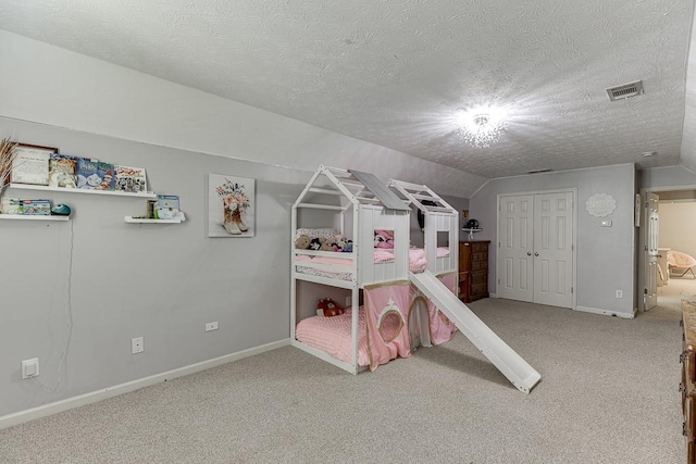 1751 Fire Side Ct, Jefferson, GA 30549 - bedroom featuring carpet, a textured ceiling, and lofted ceiling
