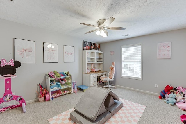 1751 Fire Side Ct, Jefferson, GA 30549 - recreation room with carpet flooring, a ceiling fan, and a textured ceiling