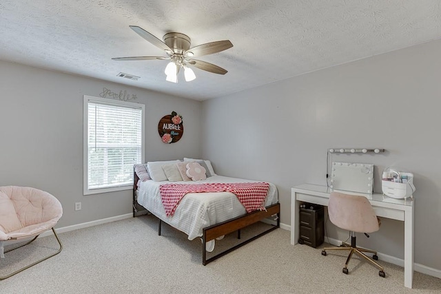1751 Fire Side Ct, Jefferson, GA 30549 - carpeted bedroom with a desk, a textured ceiling, and ceiling fan