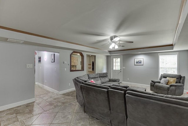 1751 Fire Side Ct, Jefferson, GA 30549 - living area featuring a tray ceiling, a ceiling fan, and arched walkways