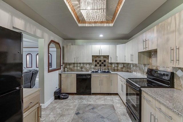 1751 Fire Side Ct, Jefferson, GA 30549 - kitchen with black appliances, a raised ceiling, tasteful backsplash, recessed lighting, and light stone counters