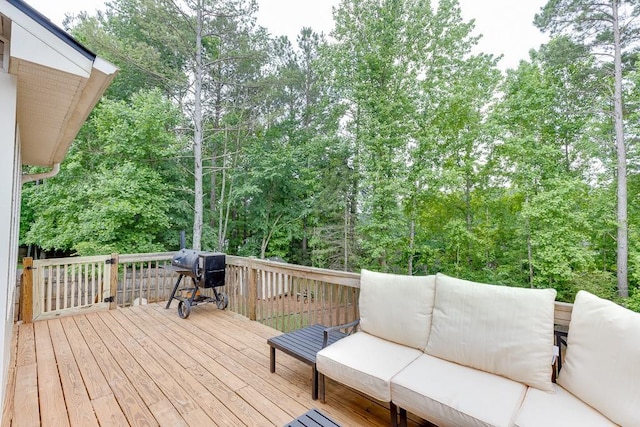 1751 Fire Side Ct, Jefferson, GA 30549 - wooden deck featuring an outdoor living space, grilling area, and view of wooded area