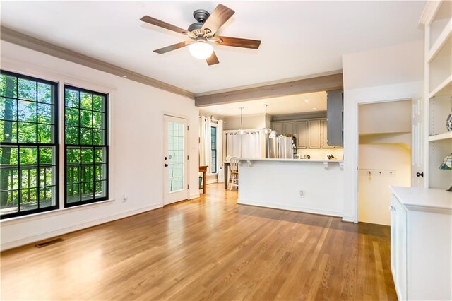 404 Summerchase Way, Woodstock, GA 30189 - unfurnished living room featuring wood finished floors, a ceiling fan, crown molding, and baseboards