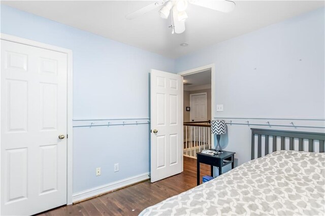 404 Summerchase Way, Woodstock, GA 30189 - bedroom with wood finished floors, ceiling fan, and baseboards