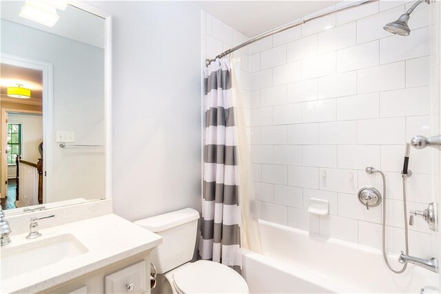 404 Summerchase Way, Woodstock, GA 30189 - bathroom featuring shower / tub combo with curtain, vanity, and toilet