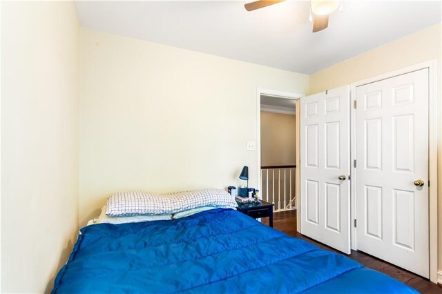 404 Summerchase Way, Woodstock, GA 30189 - bedroom with dark wood finished floors and ceiling fan
