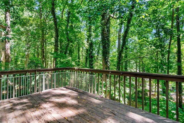 404 Summerchase Way, Woodstock, GA 30189 - wooden terrace featuring a view of trees