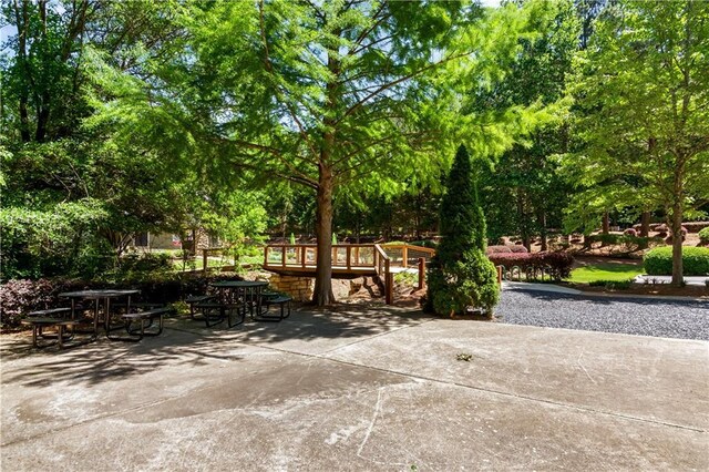 404 Summerchase Way, Woodstock, GA 30189 - view of patio featuring view of scattered trees