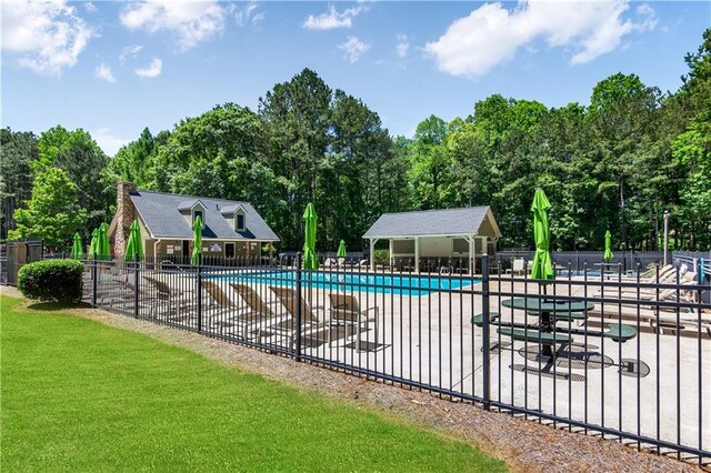 404 Summerchase Way, Woodstock, GA 30189 - community pool with a patio area