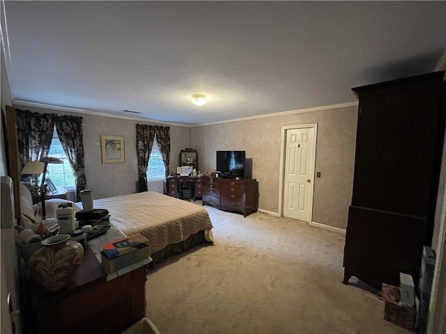 bedroom with crown molding and carpet flooring