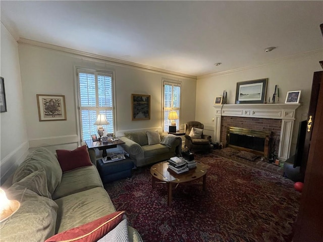 living room with crown molding, a healthy amount of sunlight, and a brick fireplace