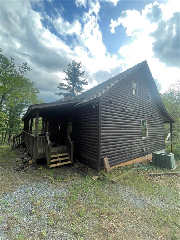 8072 Doublehead Gap Rd, Blue Ridge, GA 30513 - view of property exterior with cooling unit, faux log siding, and a deck