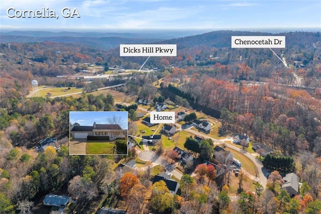 276 Arbor Gate Dr, Cornelia, GA 30531 - aerial view of property and surrounding area featuring a heavily wooded area