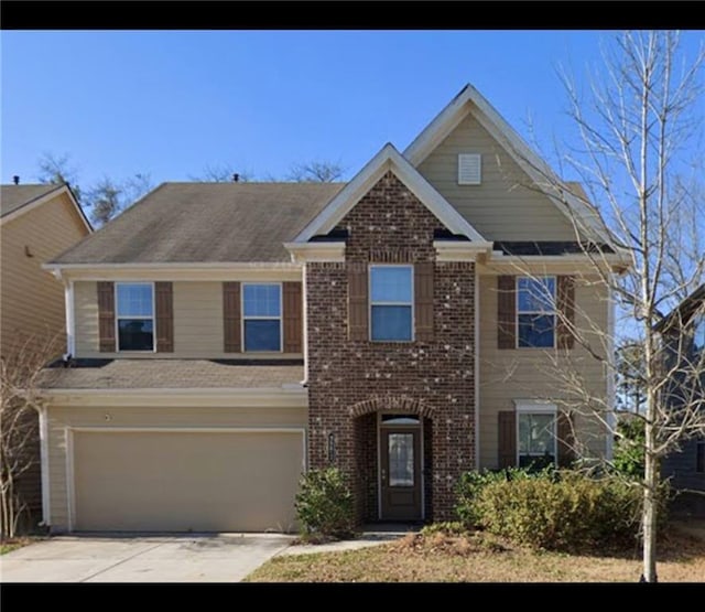 3272 Baylor Cir, Mcdonough, GA 30253 - view of front of home with a garage, driveway, and brick siding