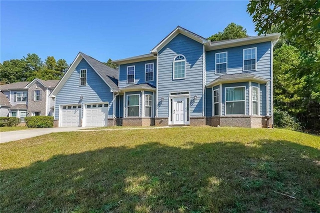view of front of home featuring concrete driveway and a front yard