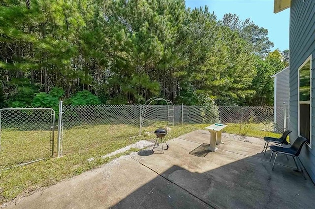 view of patio / terrace featuring fence