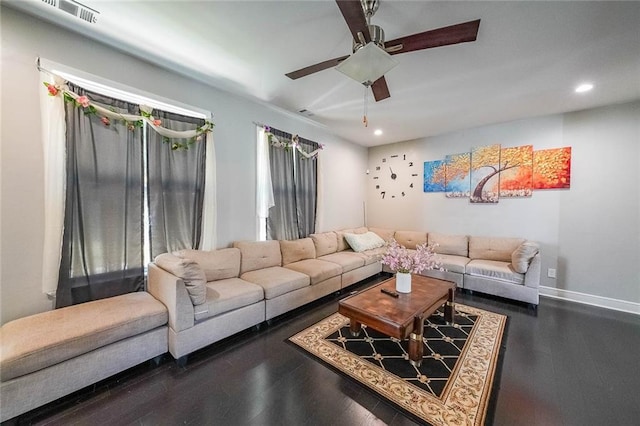 living room featuring ceiling fan, recessed lighting, baseboards, wood finished floors, and visible vents