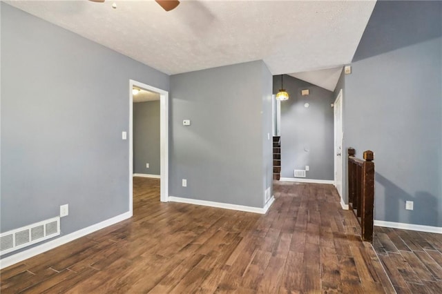 unfurnished room featuring dark hardwood / wood-style floors and ceiling fan