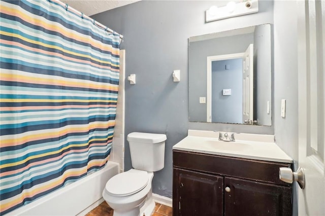 full bathroom with vanity, tile patterned flooring, toilet, and shower / tub combo with curtain