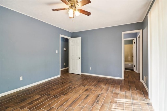 unfurnished room with ceiling fan and dark hardwood / wood-style flooring