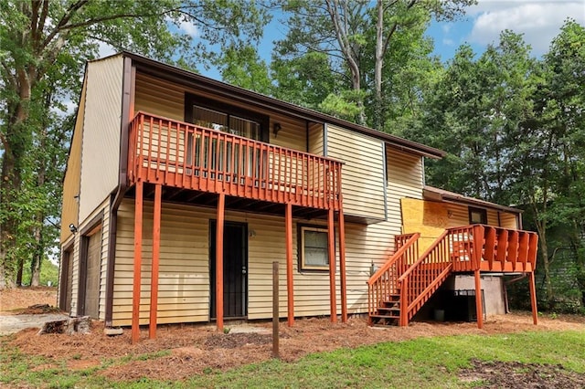 rear view of property with a deck