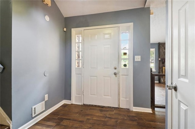 entrance foyer featuring dark hardwood / wood-style flooring