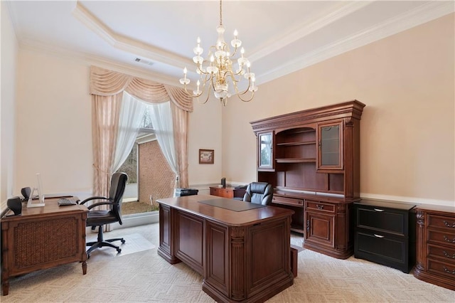 carpeted office with a notable chandelier, ornamental molding, and a tray ceiling