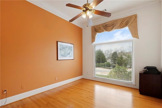 unfurnished room featuring crown molding, ceiling fan, and light hardwood / wood-style flooring