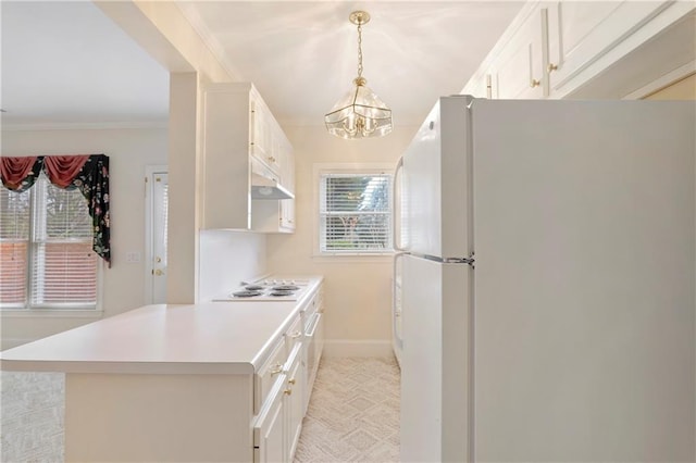 kitchen with decorative light fixtures, white appliances, a chandelier, and white cabinetry