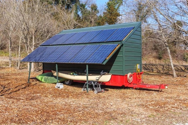 view of outdoor structure with solar panels