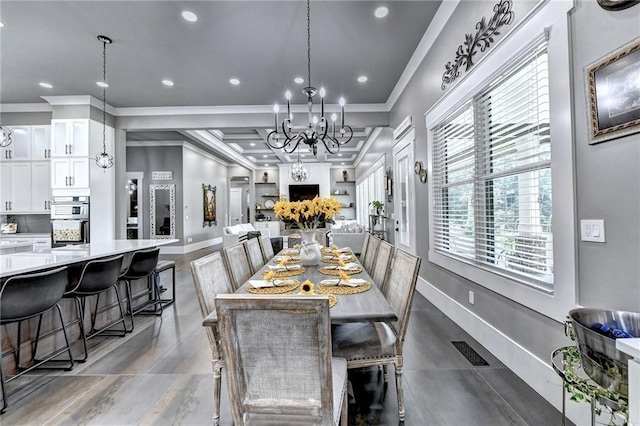 dining room featuring an inviting chandelier and crown molding