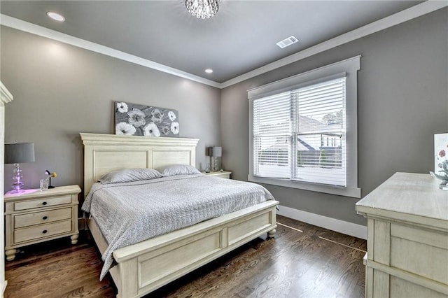 bedroom featuring ornamental molding and dark wood-type flooring