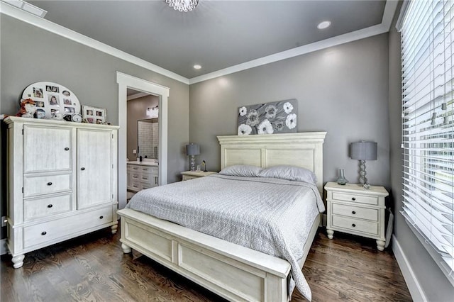 bedroom featuring ensuite bath, crown molding, and dark hardwood / wood-style floors