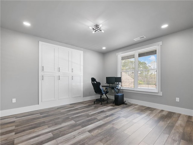 unfurnished office featuring light wood-type flooring