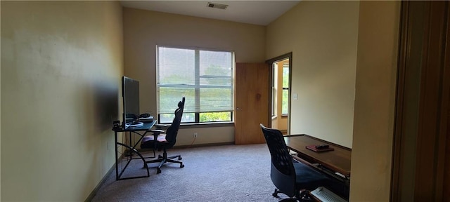 home office with carpet and visible vents