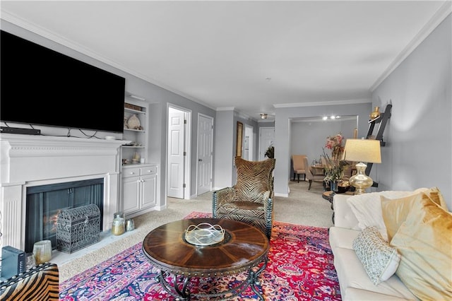 carpeted living room with ornamental molding and built in features