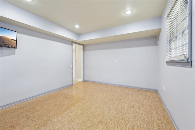 below grade area featuring recessed lighting and baseboards