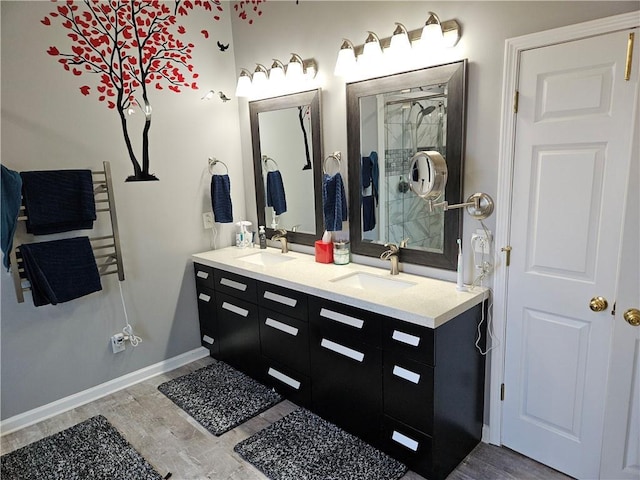 bathroom featuring vanity and wood-type flooring