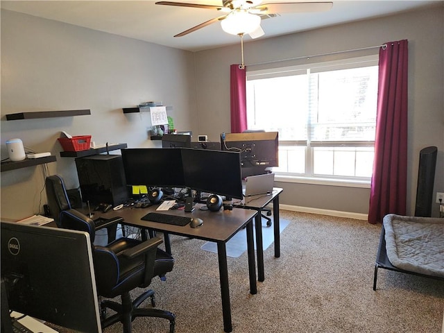 home office featuring light colored carpet and ceiling fan